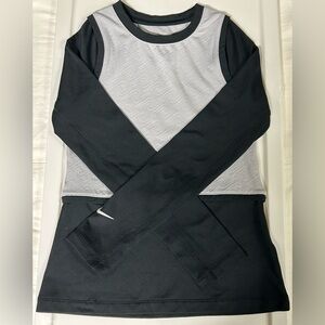 Girl’s Nike shirt.